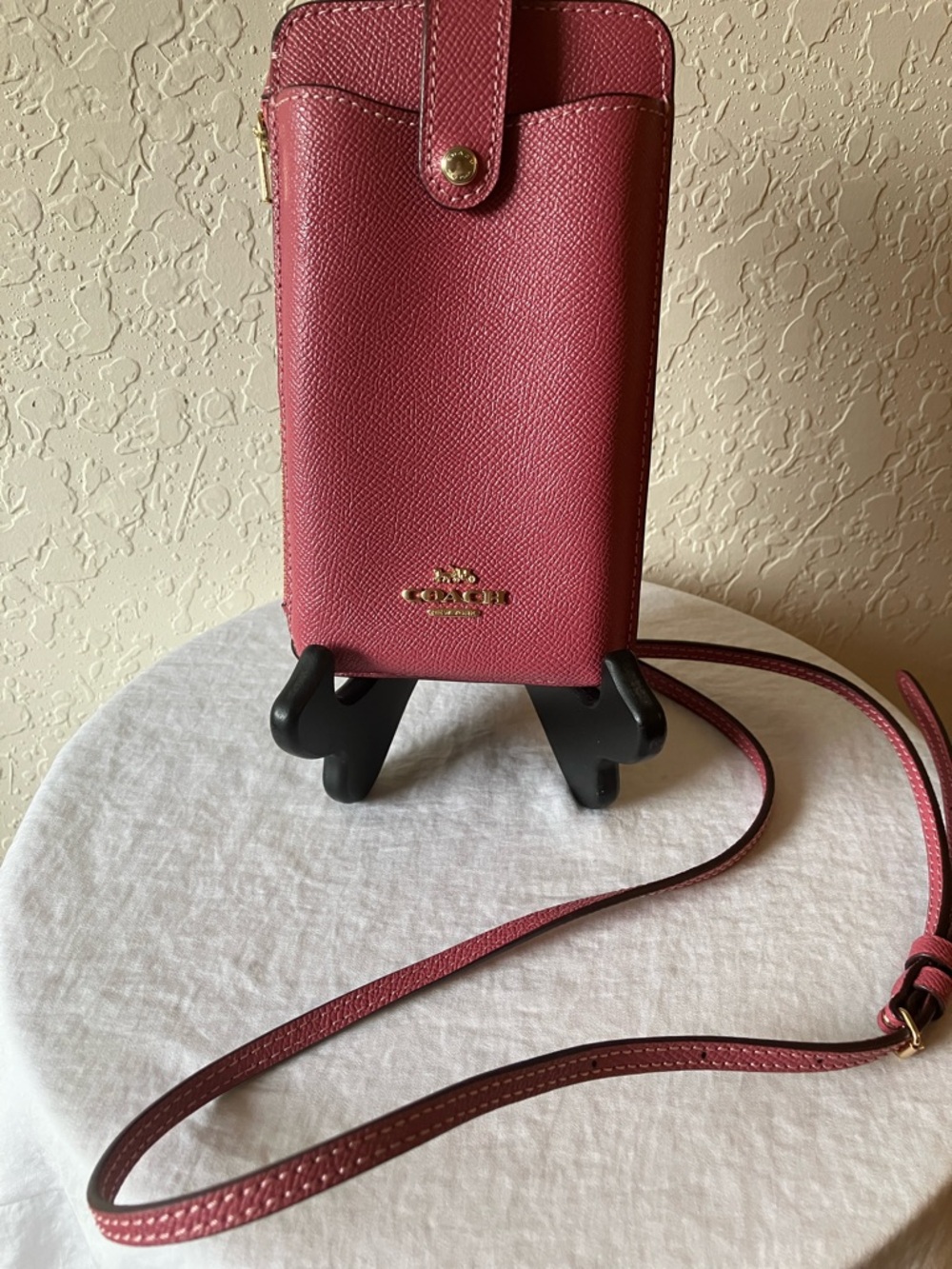 Coach: Raspberry Pink Pebbled Leather North/South Crossbody Phone Bag